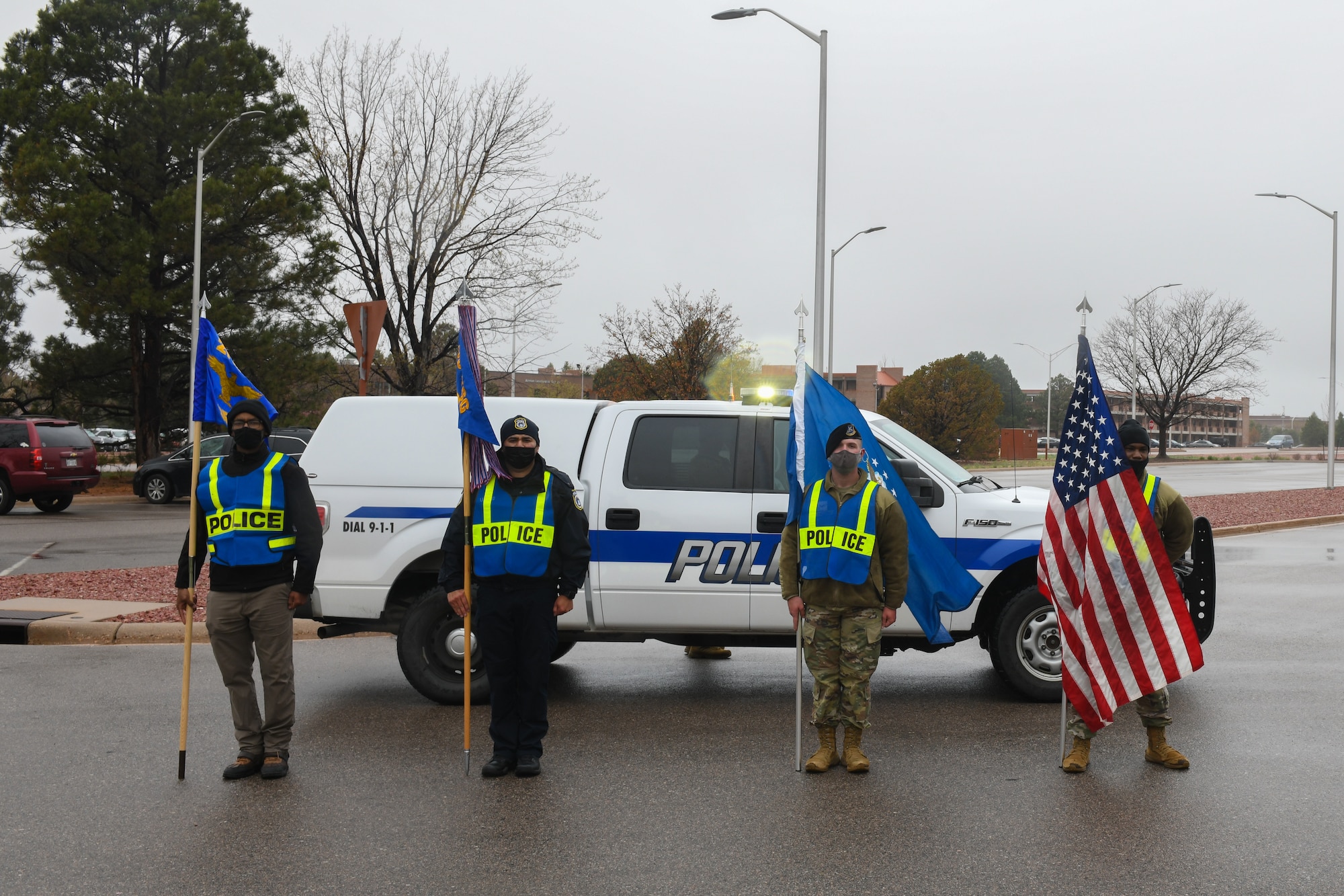 People posing with flags