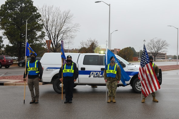 People posing with flags