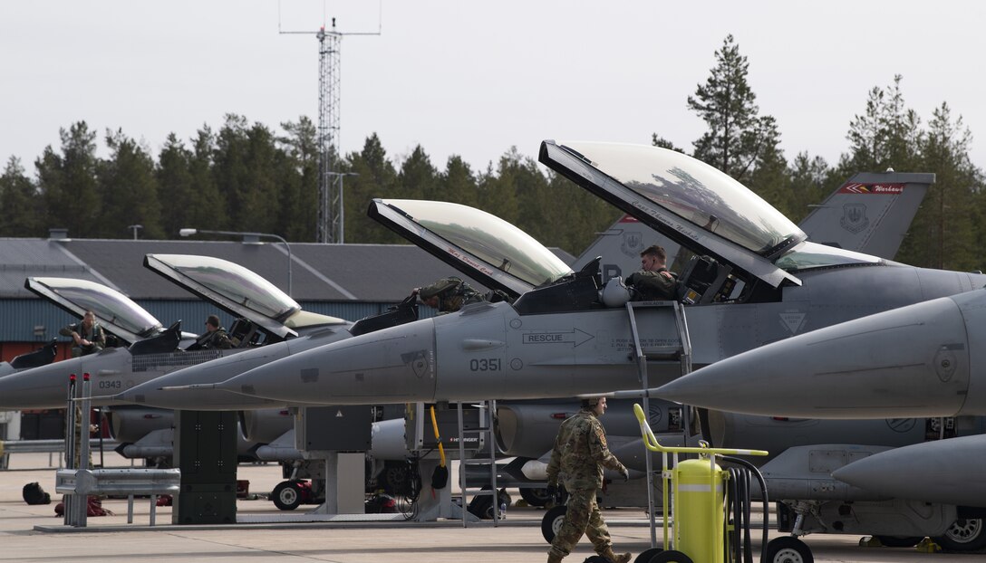 U.S. Air Force F-16 Fighting Falcon aircraft and Airmen assigned to the 52nd Fighter Wing at Spangdahlem Air Base, Germany, arrive at Kallax Air Base, Sweden, May 17, 2021. The aircraft will support Arctic Challenge Exercise 21 which builds interoperability with allies and partners to demonstrate capability and convey a strong deterrent message. (U.S. Air Force photo by Senior Airman Ali Stewart)