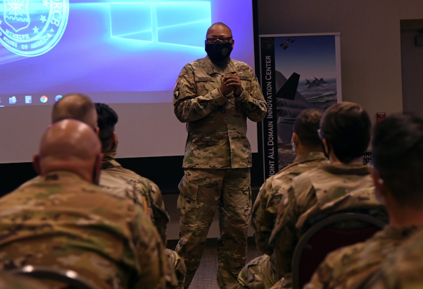 U.S. Army Command Sgt. Maj. William W. Russell III, state command sergeant major and senior enlisted leader of the Michigan National Guard addresses a group during a joint enlisted and company grade officer professional development training