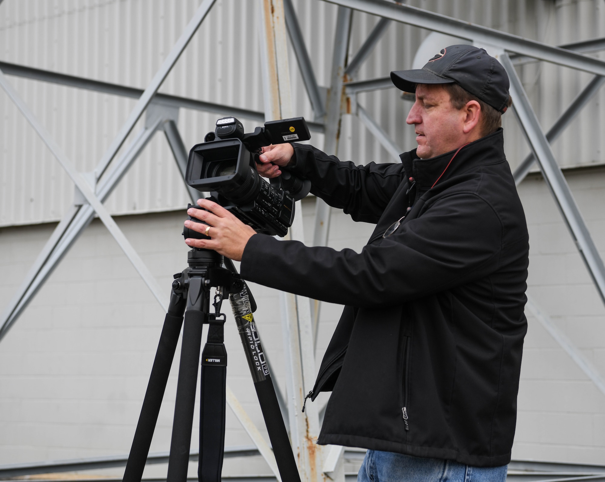 David Wright, a videographer for Arnold Engineering Development Complex, sets up his camera to capture video in support of the AEDC test mission, Dec. 14, 2020, at Arnold Air Force Base, Tenn. When not putting his video and editing skills to use at Arnold, Wright spends his free time on other creative projects, such as writing fantasy fiction novels. (U.S. Air Force photo by Jill Pickett)