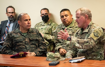 Maj. Gen. Kendall Penn, right, the Arkansas National Guard adjutant general, speaks with Maj. Gen Walfre Omar Carranza España, the Guatemalan chief of defense, during a May 13, 2021, briefing in North Little Rock about the Arkansas National Guard’s role in statewide emergencies. Arkansas and Guatemala, paired together since 2002 in the National Guard Bureau’s State Partnership Program, have a rich history of military and cultural exchanges.