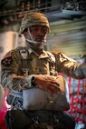 Stand up, hook up, shuffle to the door. Master Sgt. Folarin Durosawo, Headquarters and Headquarters Company, U.S. Army Civil Affairs and Psychological Operations Command (Airborne) assistant Inspector General, awaits approach to Sicily Drop Zone, Ft. Bragg, N.C., on May 1, 2021.