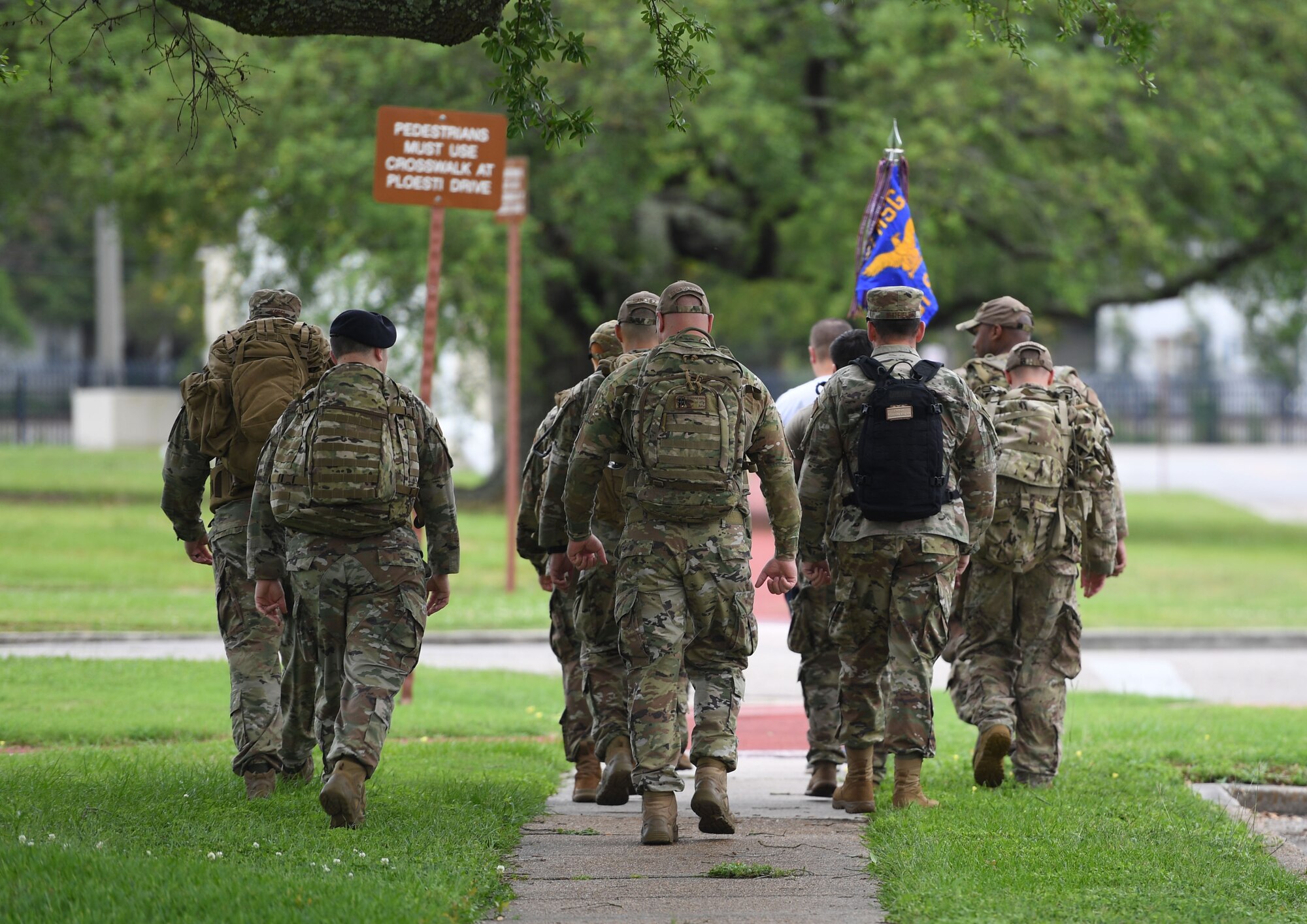 Members of the 81st Security Forces Squadron participate in an 81st SFS Ruck March/Canned Food Drive at Keesler Air Force Base, Mississippi, May 13, 2021. The event was held during National Police Week, which recognizes the men and women in law enforcement. (U.S. Air Force photo by Kemberly Groue)