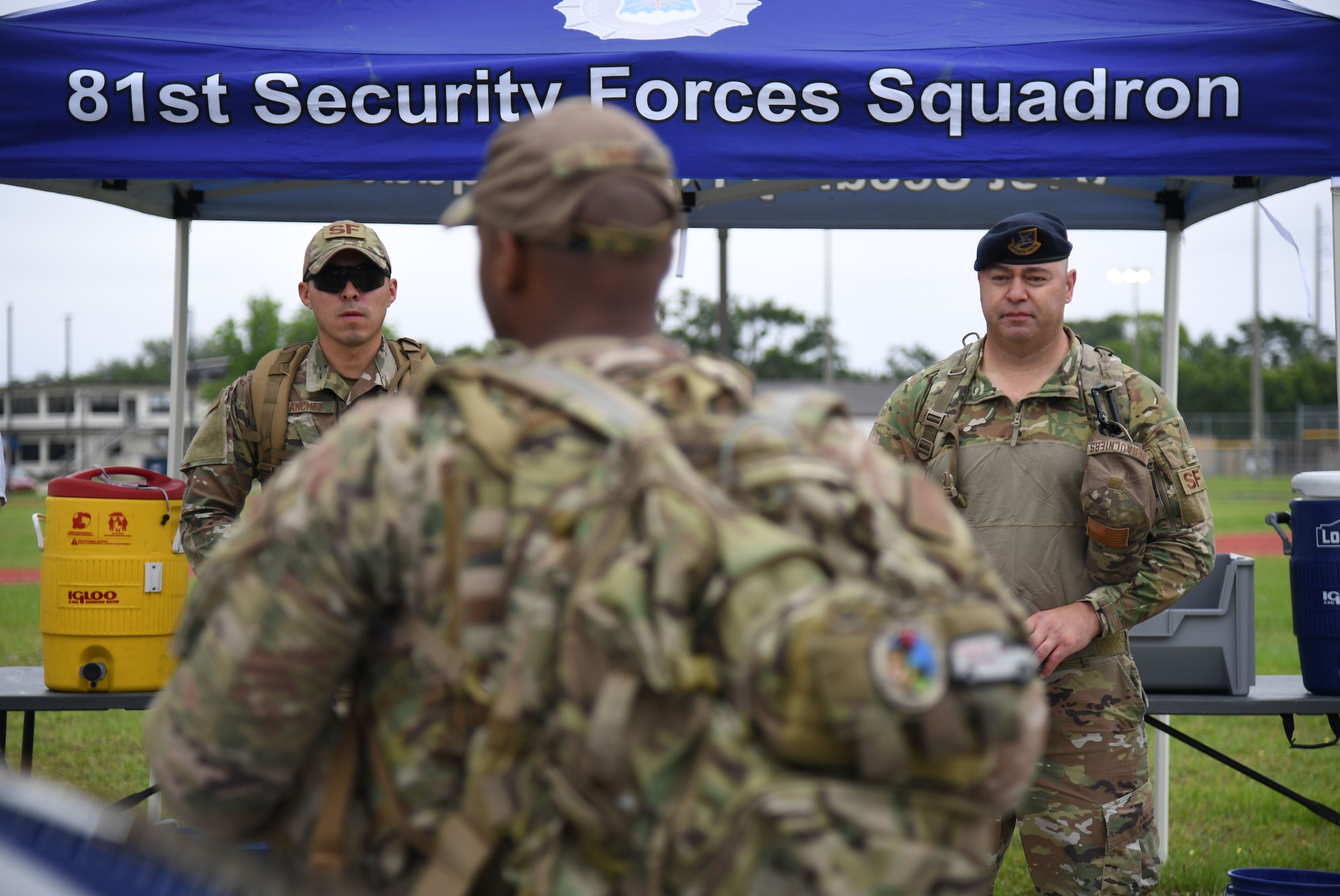 Members of the 81st Security Forces Squadron participate in an 81st SFS Ruck March/Canned Food Drive at Keesler Air Force Base, Mississippi, May 13, 2021. The event was held during National Police Week, which recognizes the men and women in law enforcement. (U.S. Air Force photo by Kemberly Groue)