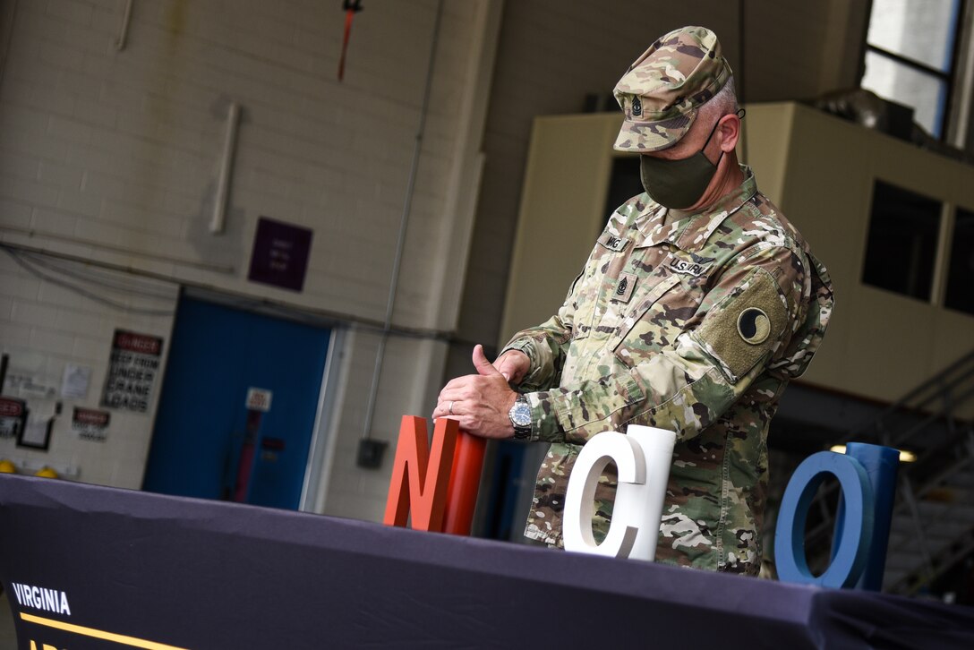 The Virginia National Guard’s 2nd Battalion, 224th Aviation Regiment welcomes newly-promoted noncommissioned officers to the NCO Corps during a ceremony held April 18, 2021, at the VNG’s Army Aviation Support Facility in Sandston, Virginia. A total of 16 NCOs, all promoted to sergeant since 2019, were recognized during the ceremony in front of state and unit enlisted leaders and members of their battalion. (U.S. Army National Guard photo by Sgt. 1st Class Terra C. Gatti)