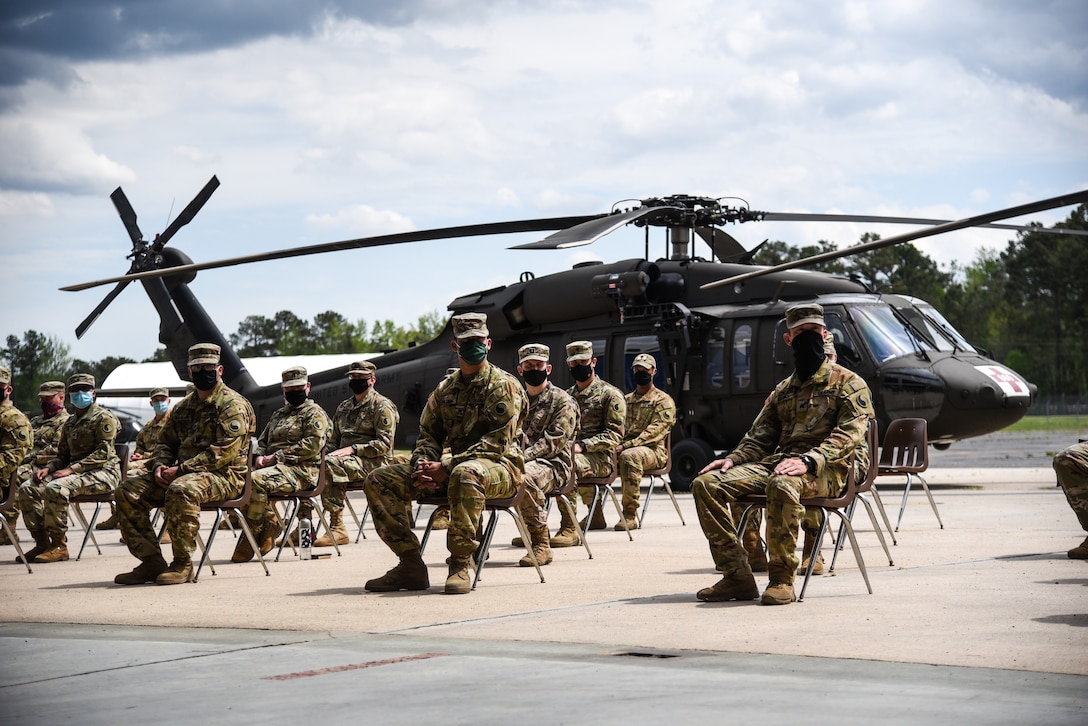 The Virginia National Guard’s 2nd Battalion, 224th Aviation Regiment welcomes newly-promoted noncommissioned officers to the NCO Corps during a ceremony held April 18, 2021, at the VNG’s Army Aviation Support Facility in Sandston, Virginia. A total of 16 NCOs, all promoted to sergeant since 2019, were recognized during the ceremony in front of state and unit enlisted leaders and members of their battalion. (U.S. Army National Guard photo by Sgt. 1st Class Terra C. Gatti)