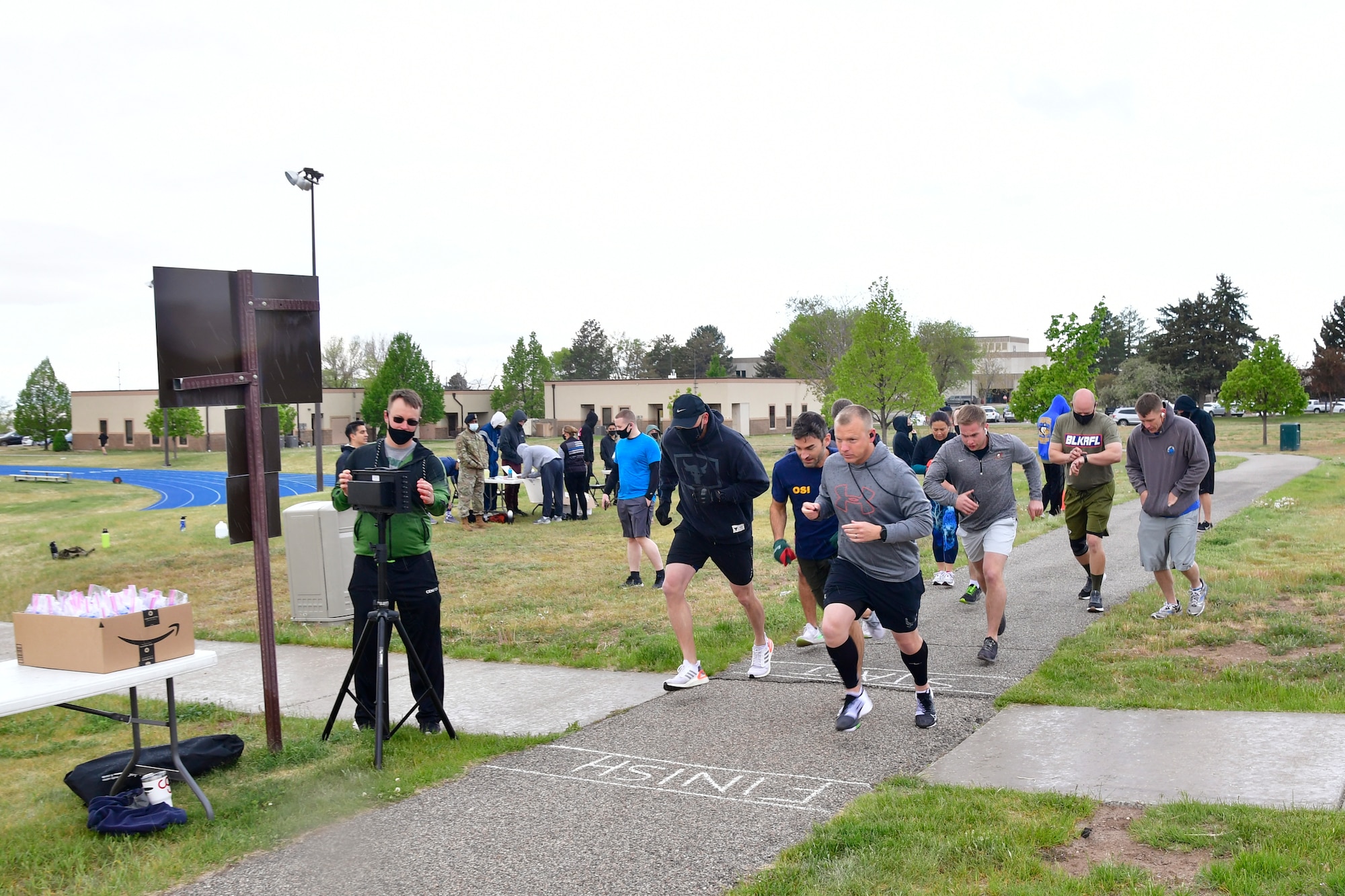 Participants at the beginning of the National Police Week fun run/walk/ruck May10, 2021, at Hill Air Force Base, Utah. The event was one of many the 75th Security Forces Squadron hosted to commemorate the week to honor the sacrifices of the law enforcement community. (U.S. Air Force photo by Todd Cromar)