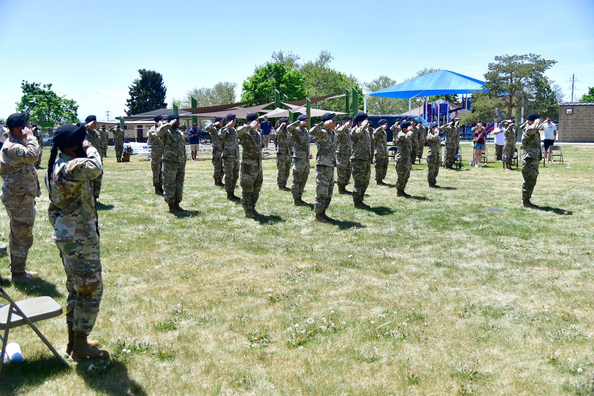 Airmen from the 75th Security Forces Squadron render a salute during a ceremonial guard mount to honor fallen security forces members during National Police Week May 14, 2021, at Hill Air Force Base, Utah. The guard mount was one of many events 75th SFS hosted to commemorate the week to honor the sacrifices of the law enforcement community. (U.S. Air Force photo by Todd Cromar)