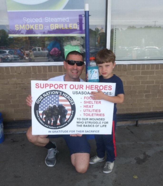 Senior Master Sgt. Stephen Agnelli, Air National Guard Readiness Center recruiting superintendent, and his son, attend a “Boots On The Ground” event to collect donations such as money, food and toiletries to support homeless and elderly veterans in Annapolis, Md., in 2017. (Courtesy Photo)