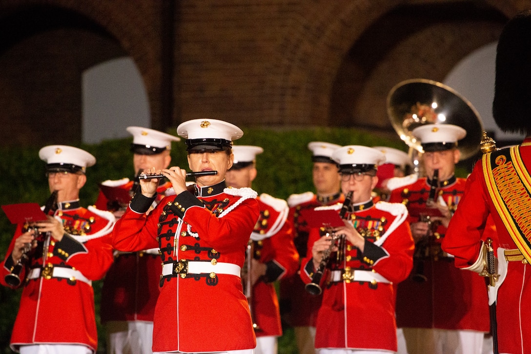 Gunnery Sgt. Ellen Dolley, piccolo player, “The Presidents Own,” U.S. Marine Band performs a solo at the Marine Barracks Washington, D.C., May 14, 2021.  The Deputy Commandant for Combat Development and Integration and Commanding General of Marine Corps Combat Development Command Lt. Gen. Eric M. Smith, was the hosting official, and the guests of honor were the 12th NASA Administrator the Honorable Charles F. Bolden, Jr., Maj. Gen., USMC (Ret.); NASA Astronaut and active duty Marine Lt. Col. Nicole A. Man; and NASA Astronaut and active duty Marine Maj. Jasmin Moghbeli.  (U.S. Marine Corps photo by Lance Cpl. Allen Sanders)
