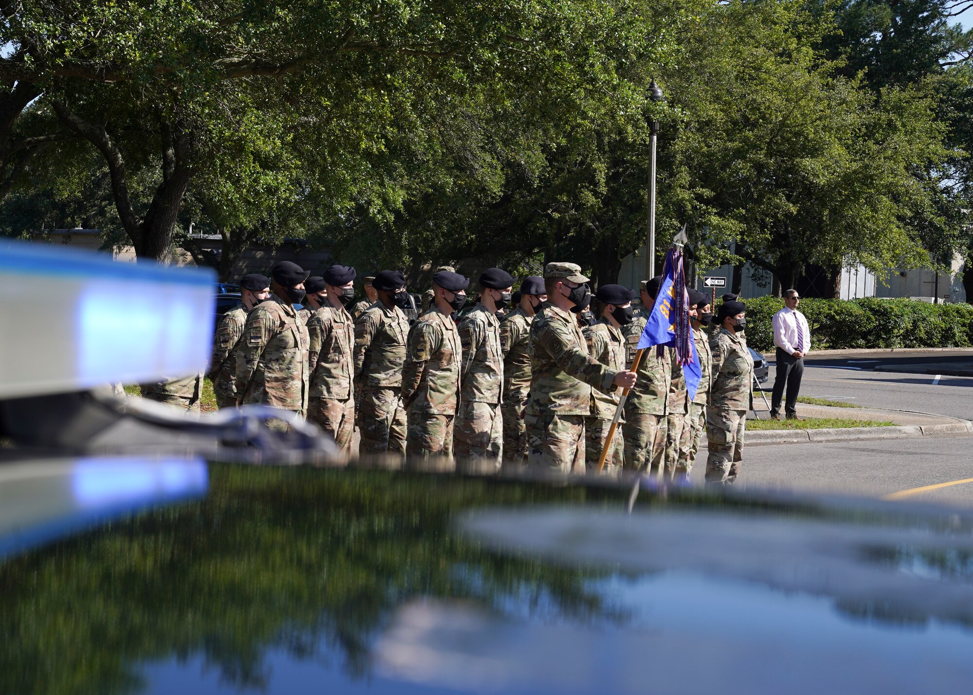 Airmen from the 81st Security Forces Squadron stand in formation during the Police Week retreat ceremony at Keesler Air Force Base, Mississippi, May 14, 2021. The event was held during National Police Week, recognizing the men and women in law enforcement. (U.S. Air Force photo by Senior Airman Spencer Tobler)