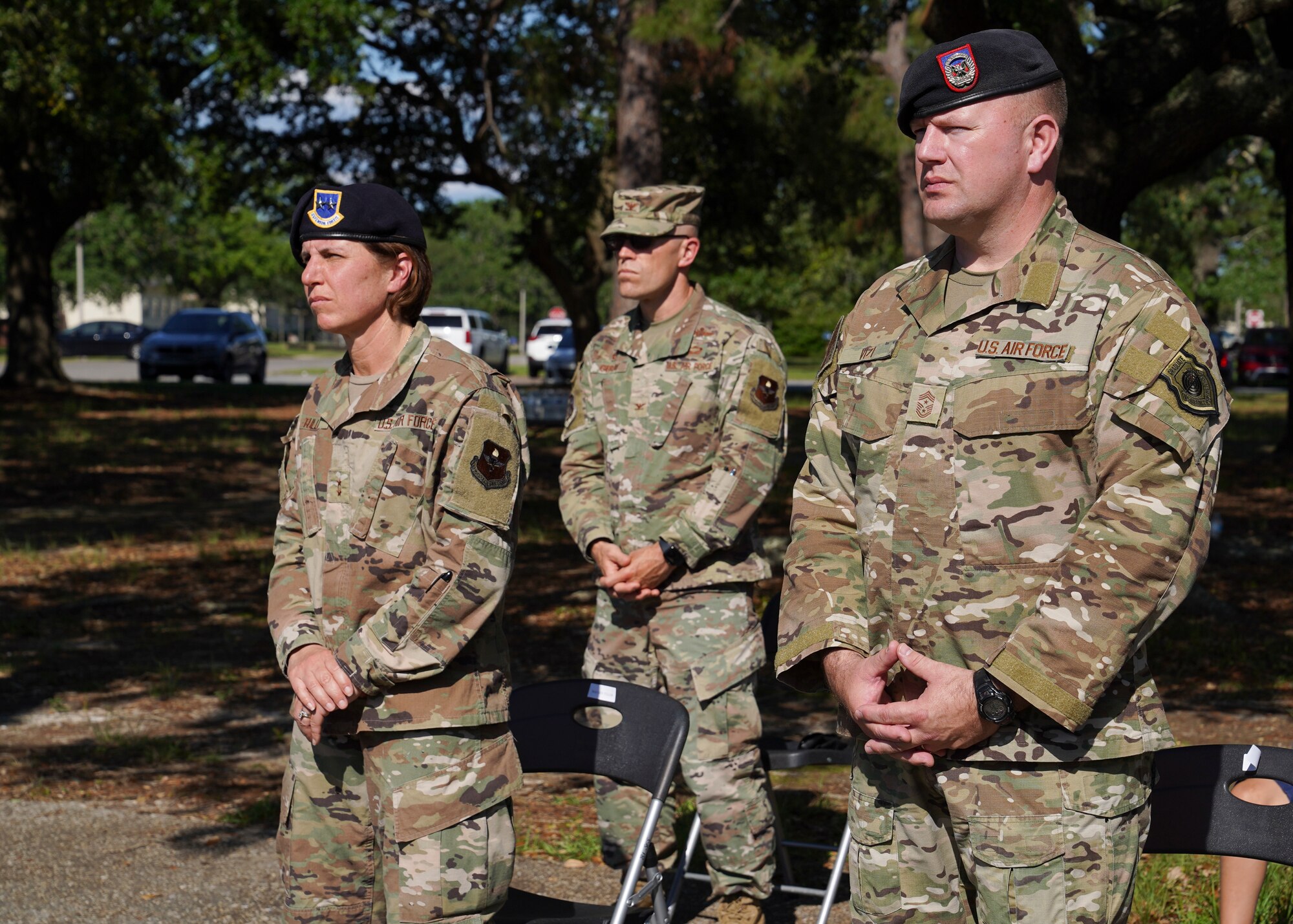 U.S. Air Force Maj. Gen. Andrea Tullos, Second Air Force commander, Chief Master Sgt. Adam Vizi, Second Air Force command chief, and Col. Chance Geray, 81st Training Group commander, stand during the Police Week retreat ceremony at Keesler Air Force Base, Mississippi, May 14, 2021. The event was held during National Police Week, recognizing the men and women in law enforcement. (U.S. Air Force photo by Senior Airman Spencer Tobler)