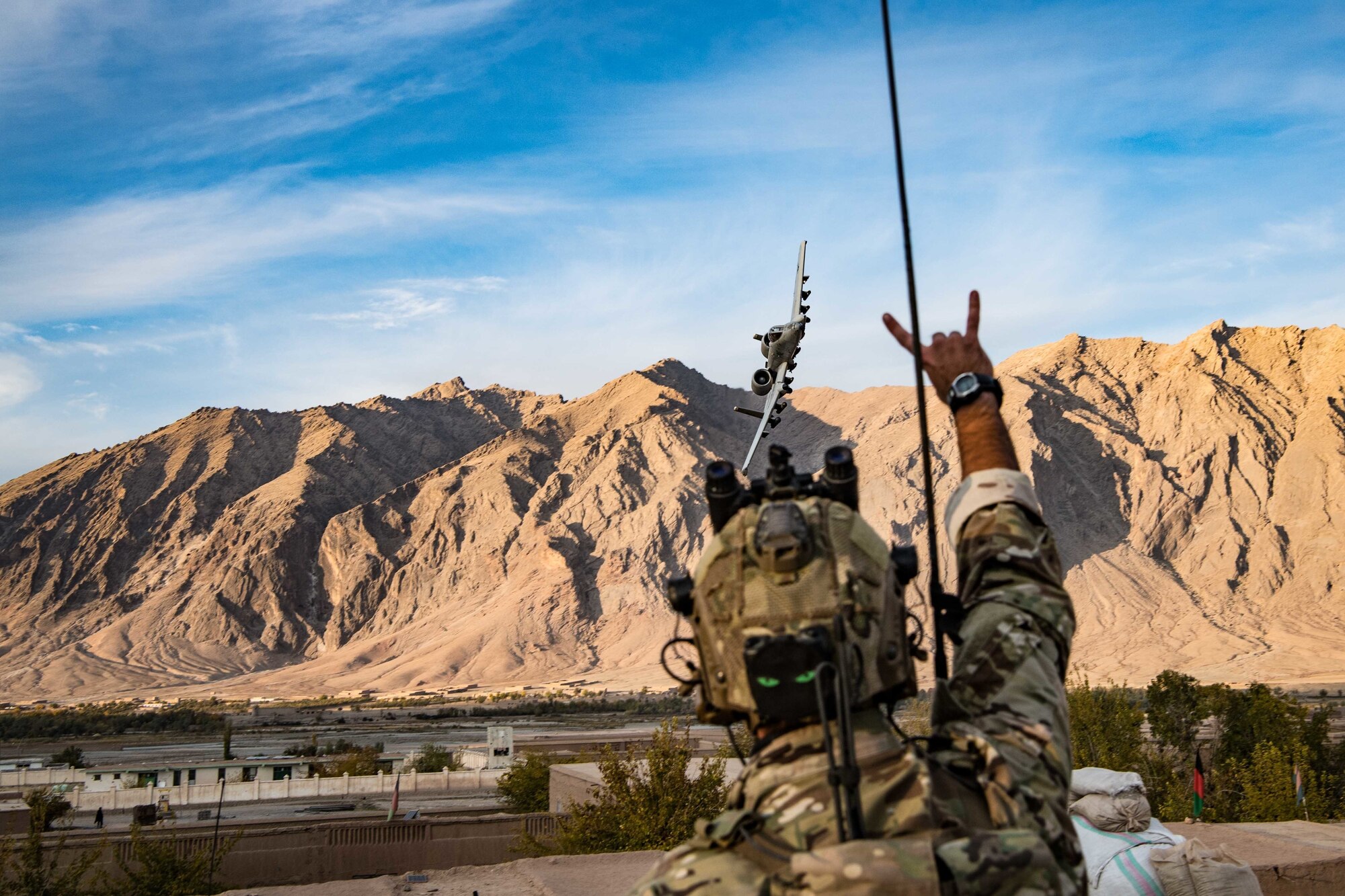 A U.S. Air Force special tactics officer controls aircraft during Operation Resolute Support at an undisclosed location in Afghanistan, Nov. 18, 2019.