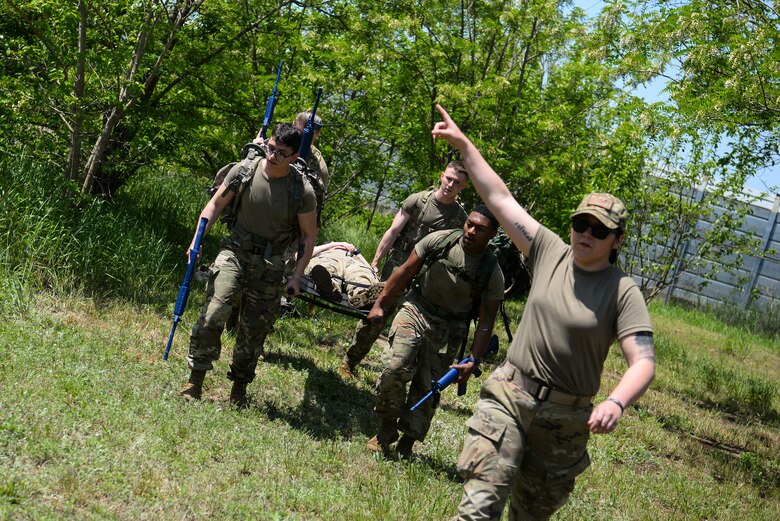 Airmen participate in the Police Week defender's challenge.