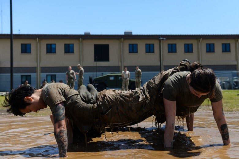 Airmen perform a fire-team push-up.