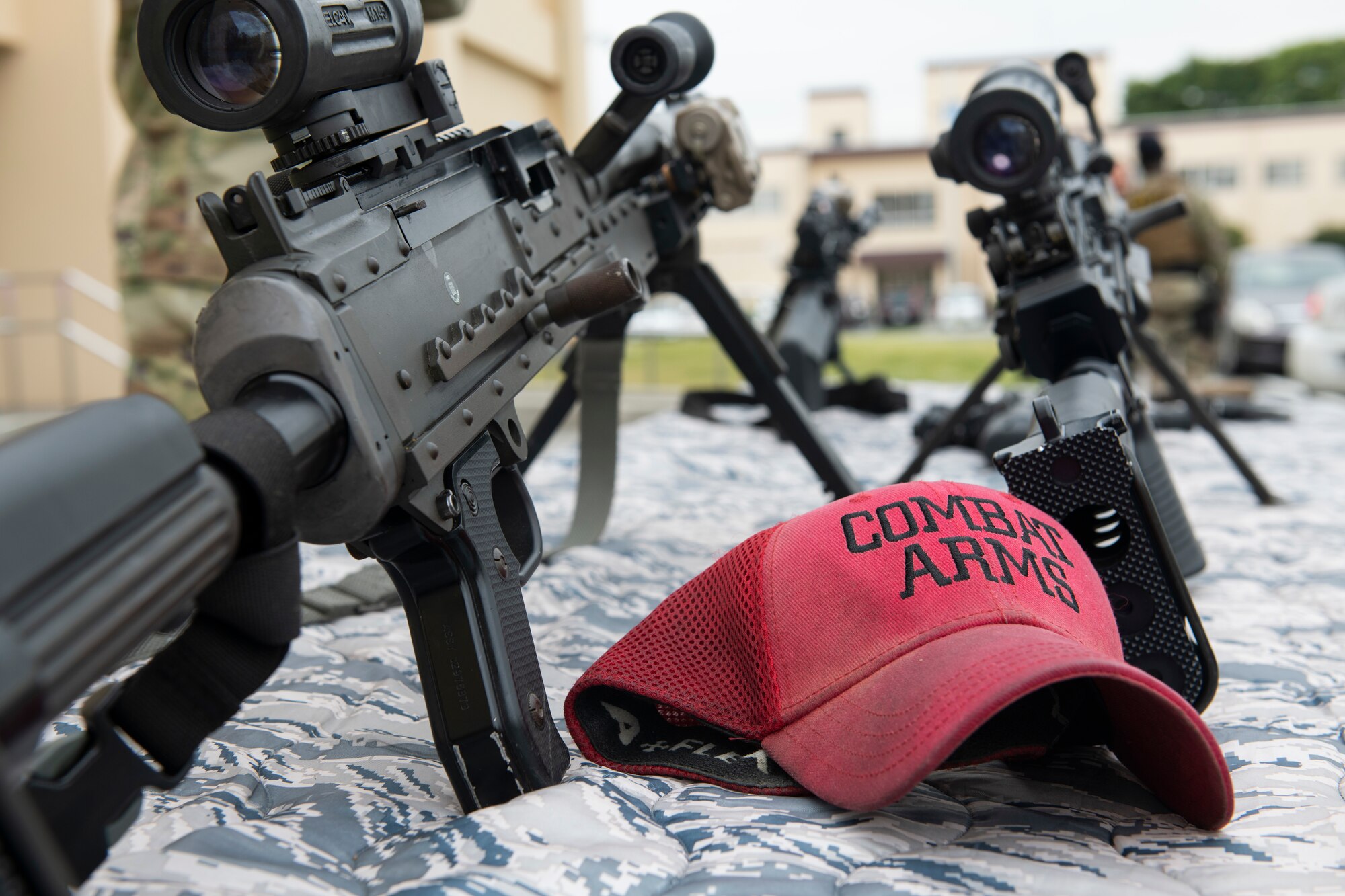 The 374th Security Forces Squadron Combat Arms set up a display for the “Day in the Life” event during National Police Week at Yokota Air Base, Japan, May 11, 2021.  The display featured various weapons security forces uses to protect the base. (U.S. Air Force photo by Staff Sgt. Joshua Edwards)