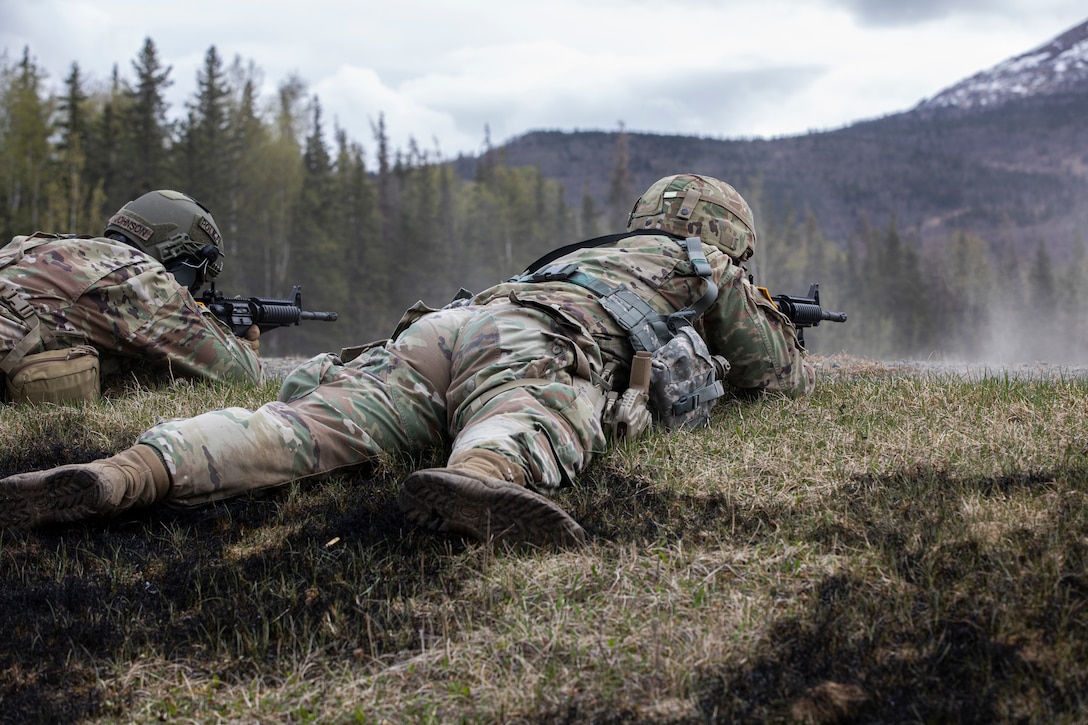 Alaska National Guardsman Spc. Robert Cline, an infantryman assigned to the 1st Battalion, 297th Infantry Regiment, tests his marksmanship skills as a part of the Alaska Army National Guard Best Warrior Competition May 15, 2021, at Joint Base Elmendorf-Richardson. The Best Warrior Competition recognizes Soldiers who demonstrate commitment to the Army values and embody the warrior ethos. (U.S. Army National Guard photo by Spc. Marc Marmeto).