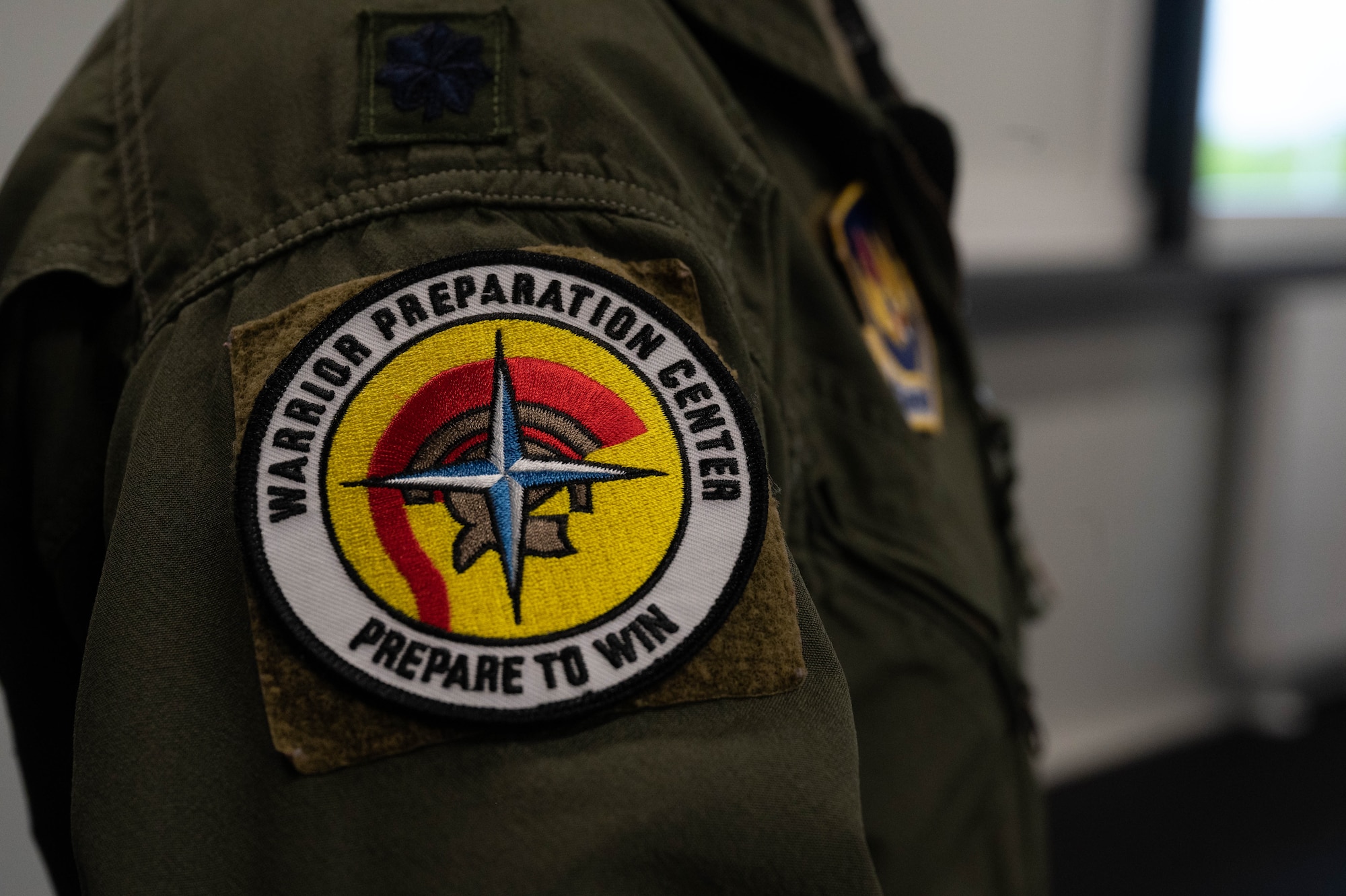 An Airman wears her unit patch.