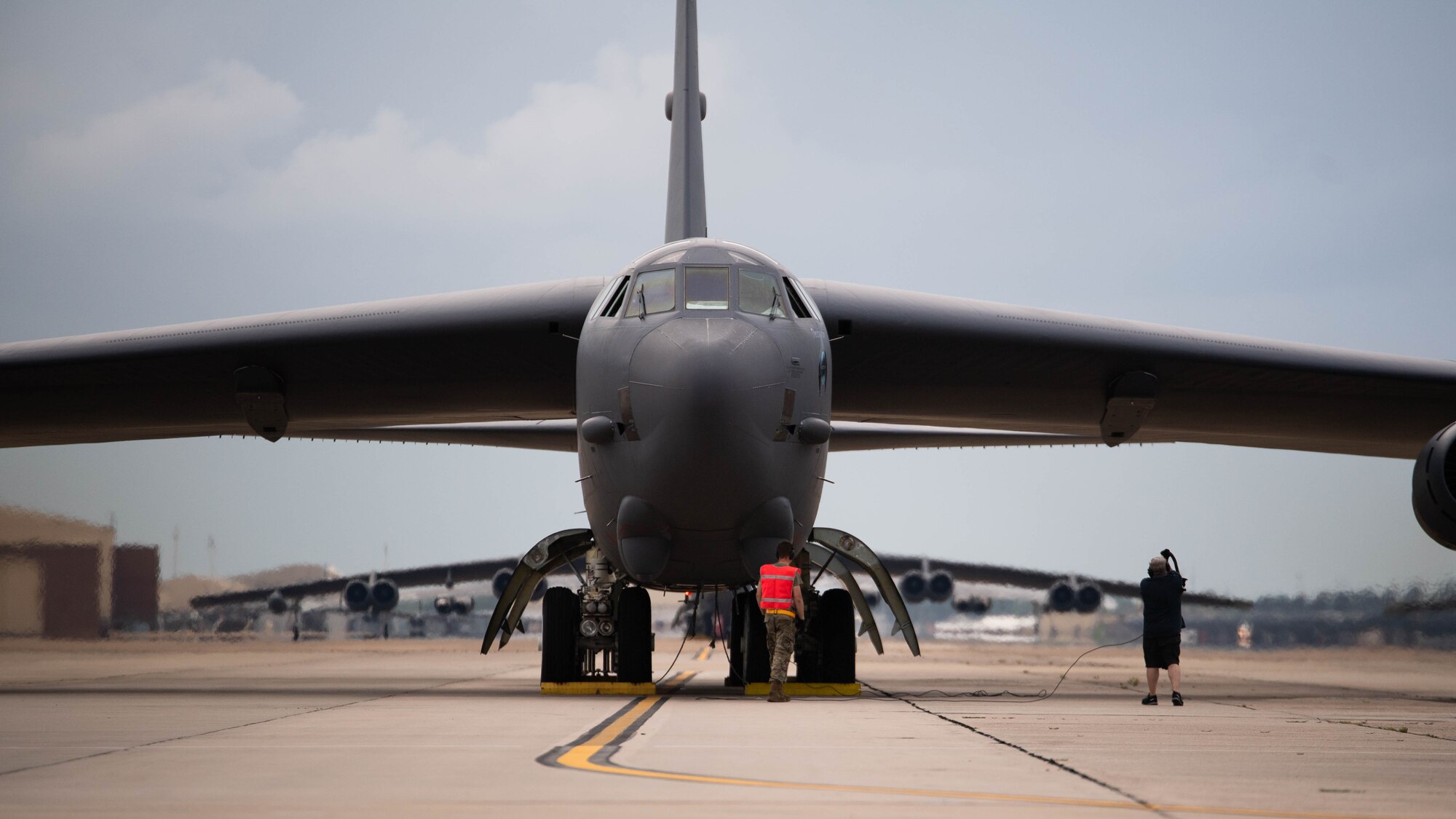 Barksdale Airmen prepare a B-52H Stratofortress for takeoff at Barksdale Air Force Base, Louisiana, May 16, 2021. The bomber is capable of flying at high subsonic speeds at altitudes up to 50,000 feet (15,166.6 meters). It can carry nuclear or precision guided conventional ordnance with worldwide precision navigation capability. (U.S. Air Force photo by Senior Airman Jacob B. Wrightsman)