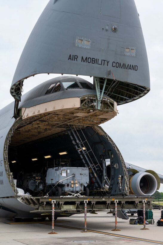 A C-5M Super Galaxy is loaded with cargo at Dover Air Force Base, Delaware, prior to departure for Exercise Mobility Guardian 2021, May 16, 2021. Exercise Mobility Guardian is the Air Mobility Command’s largest and longest training event. The exercise, led by Air Mobility Command, aims to accelerate change by developing the force and advancing warfighting capabilities to enhance our ability to project the joint force and ensure strategic deterrence. (U.S. Air Force photo by Airman 1st Class Cydney Lee)