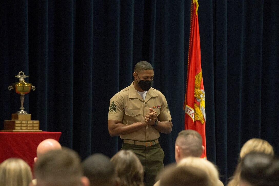 Sergeant Cameron Williams, 40th Color Sergeant of the Marine Corps, gives remarks during the Color Sergeant of the Marine Corps relief and appointment ceremony at Marine Barracks Washington, D.C., May 17, 2021. The Color Sergeant of the Marine Corps serves as the senior sergeant of the Corps, entrusted with carrying the National Ensign in ceremonies throughout the National Capital Region and across the nation. The Color Sergeant leads the official Color Guard Platoon at MBW at is responsible for training and preparing the Marines for future service in the operating forces. (U.S. Marine Corps photo by Lance Cpl. Mark Morales)