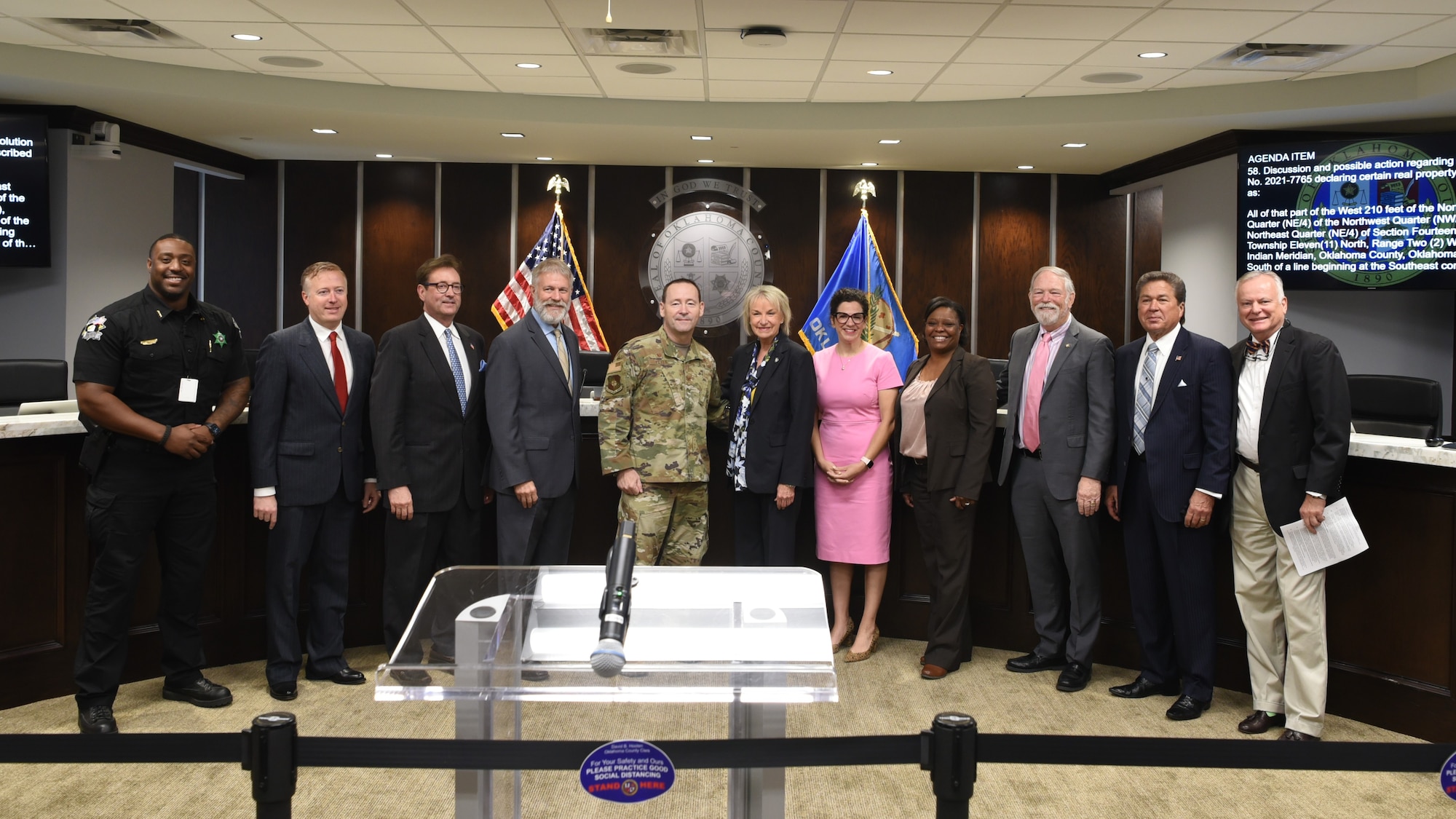 Members of Tinker AFB and Oklahoma County Commissioners Board posing for group photo.