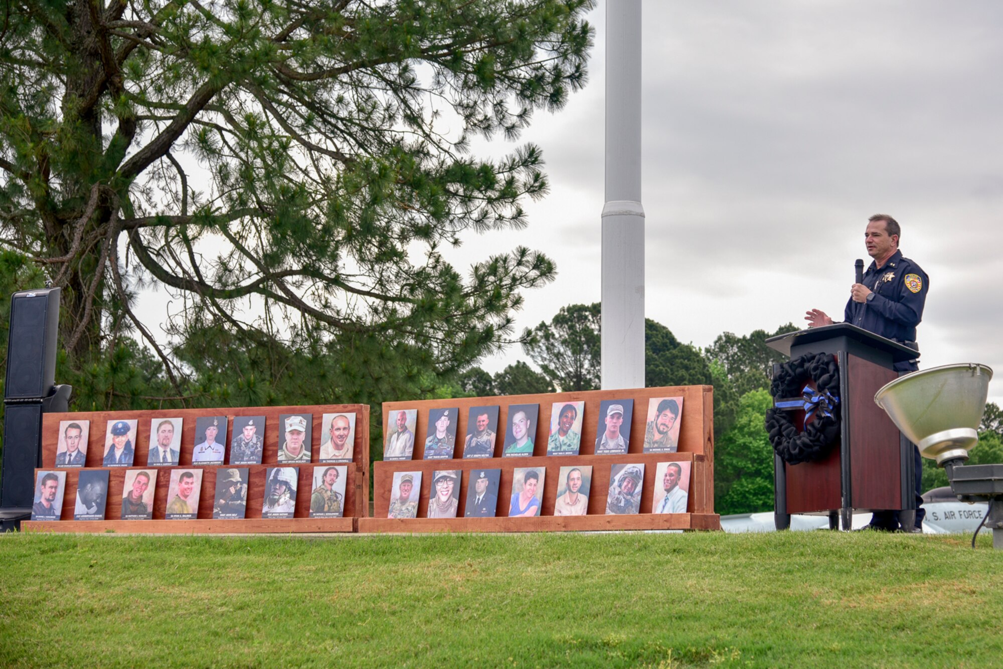 Airmen attend the opening ceremony for National Police Week