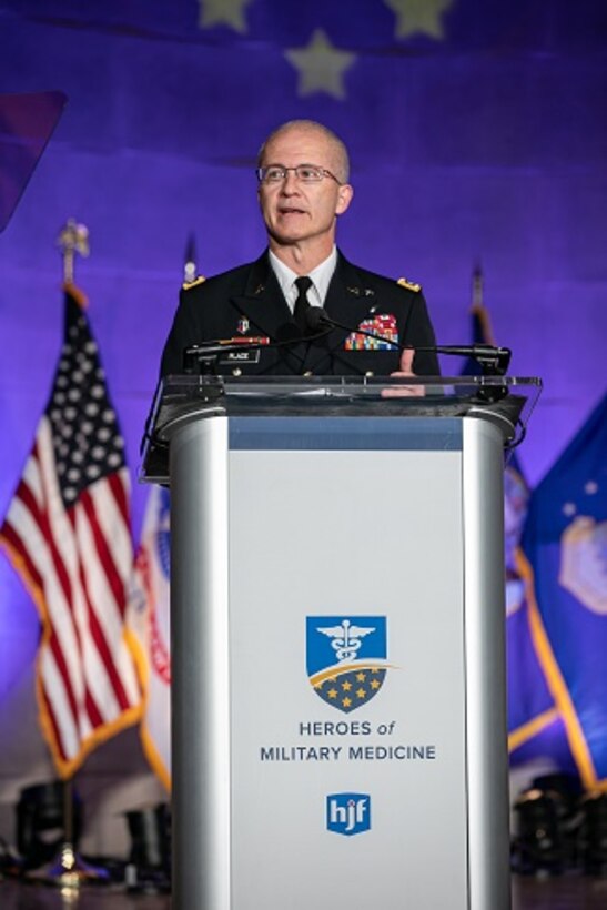 Image of a soldier at a podium