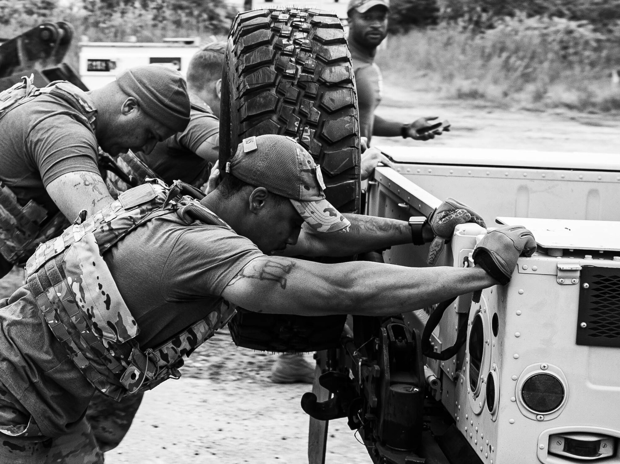 Members of the 633rd Security Forces Squadron competed in the Defender’s Challenge as part of National Police Week at Joint Base Langley-Eustis, Virginia, May 13, 2021. Event coordinators allowed relaxation of uniform-wear throughout the duration of the events. The Defender’s Challenge consisted of five stations including weapon assembly and disassembly, a buddy carry and a Humvee push. 
(U.S. Air Force photo by Senior Airman Marcus Bullock)