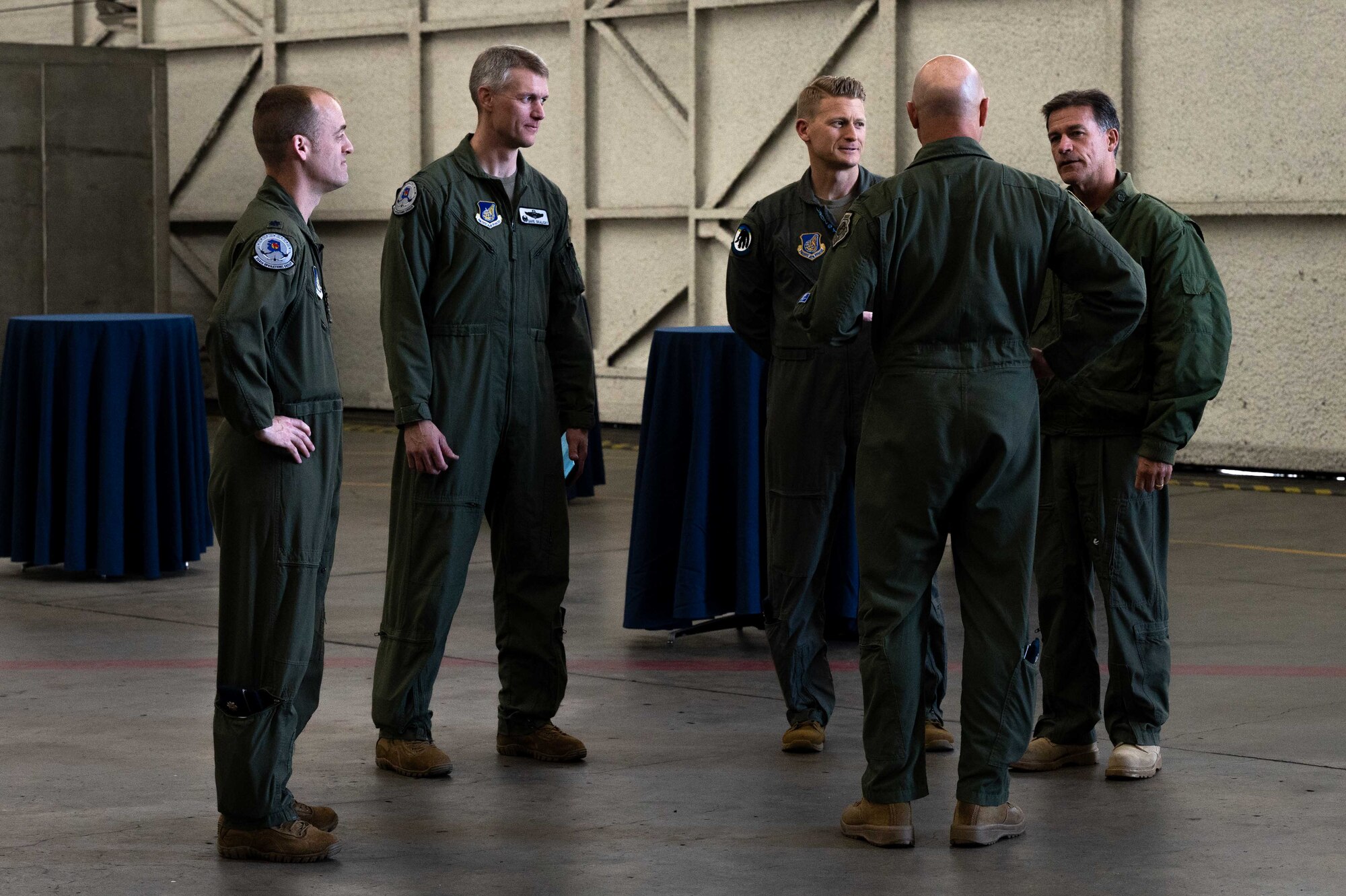 U.S. Navy Adm. John Aquilino, right, the U.S. Indo-Pacific Command (USINDOPACOM) commander, speaks with the leadership from the 354th Fighter Wing, on Eielson Air Force Base, Alaska, May 15, 2021.