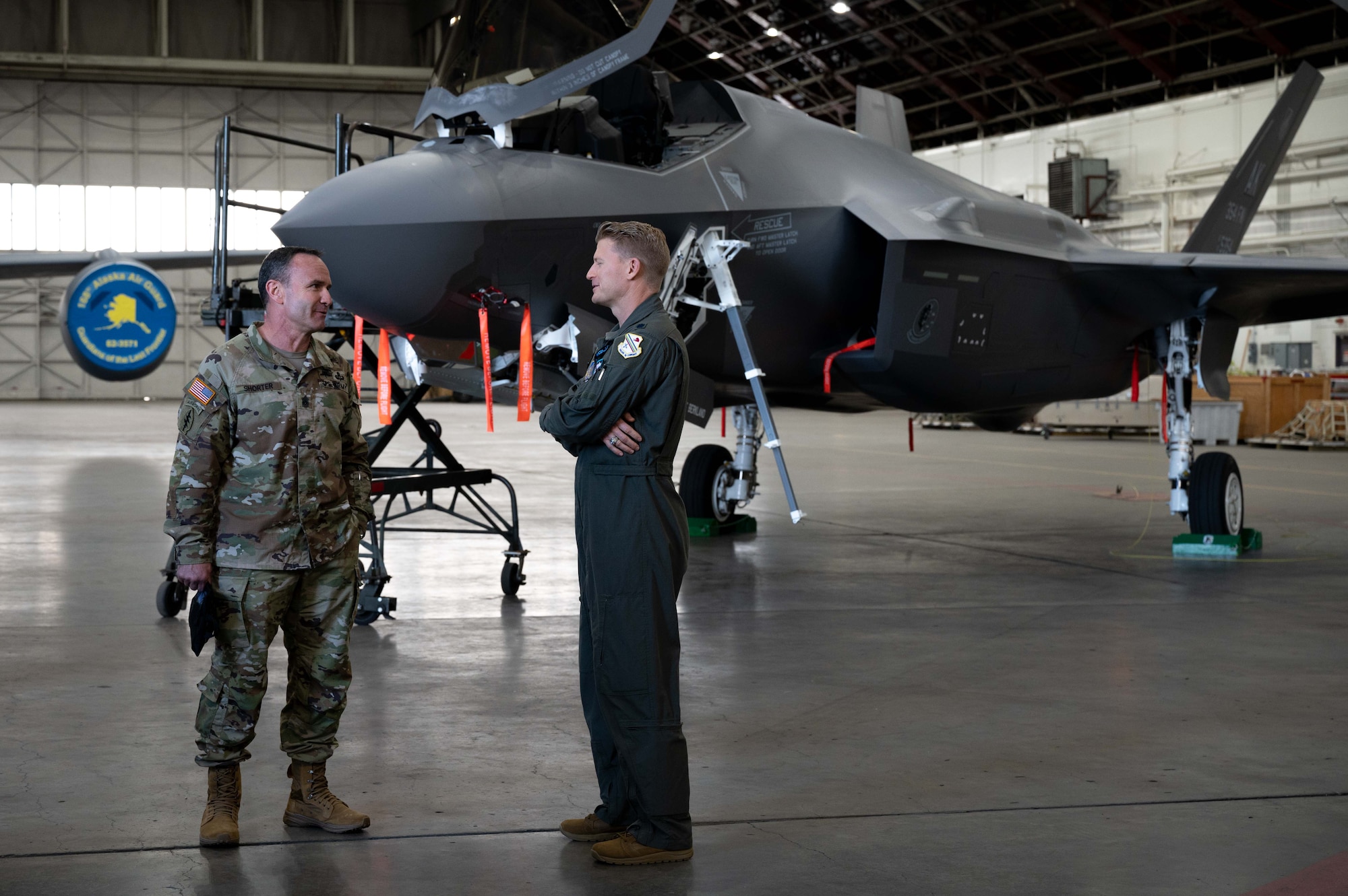 U.S. Army Command Sgt. Maj. Shane Shorter, the U.S. Indo-Pacific Command (USINDOPACOM) command senior enlisted leader, left, talks to Air Force Lt. Col. Daniel Wynn, the 354th Range Squadron commander, during a leadership visit on Eielson Air Force Base, Alaska, May 15, 2021.