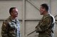 U.S. Army Command Sgt. Maj. Shane Shorter, left, the U.S. Indo-Pacific Command (USINDOPACOM) command senior enlisted leader, talks to Air Force Col. Matthew Powell, the 354th Maintenance Group commander, during a leadership visit on Eielson Air Force Base, Alaska, May 15, 2021.