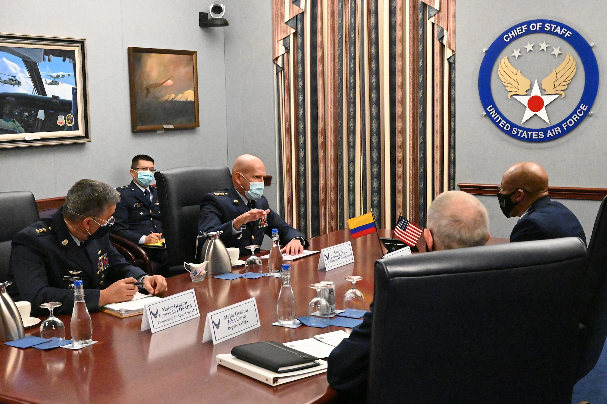 Chief of Staff of the Air Force Gen. Charles Q. Brown Jr.
speaks with Gen. Ramses Rueda Rueda, commander of the Colombian air force