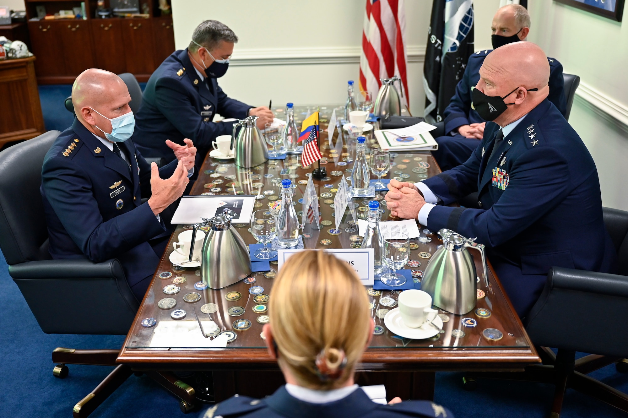 Gen. Ramses Rueda Rueda, left, commander of the Colombian air force, speaks with Chief of Space Operations Gen. John W. Raymond during a meeting