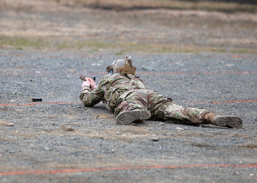 Alaska National Guard Soldiers and Airmen compete amongst one another in a series of marksmanship events at Joint Base Elmendorf-Richardson, May 15, 2021, as part of the 2021 Alaska National Guard Adjutant General Match, or TAG Match. TAG Match is a marksmanship competition comprising several timed pistol and rifle events. (U.S. Army National Guard photo by Spc. Grace Nechanicky)