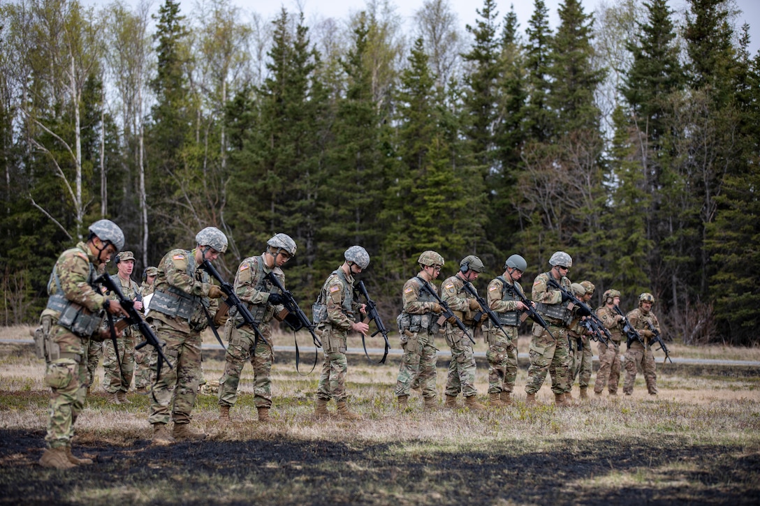 Alaska National Guard Soldiers and Airmen compete amongst one another in a series of marksmanship events at Joint Base Elmendorf-Richardson, May 15, 2021, as part of the 2021 Alaska National Guard Adjutant General Match, or TAG Match. TAG Match is a marksmanship competition comprising several timed pistol and rifle events. (U.S. Army National Guard photo by Spc. Grace Nechanicky)