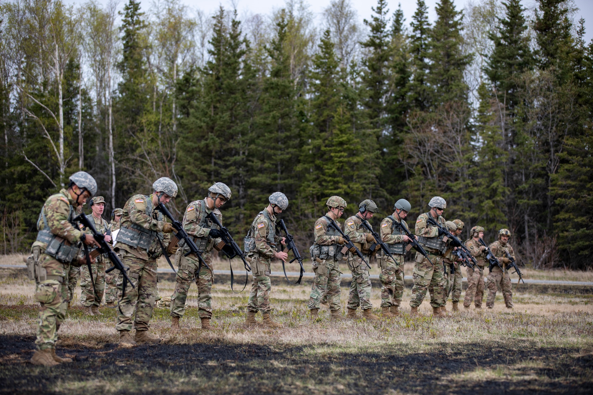 Alaska National Guard Soldiers and Airmen compete amongst one another in a series of marksmanship events at Joint Base Elmendorf-Richardson, May 15, 2021, as part of the 2021 Alaska National Guard Adjutant General Match, or TAG Match. TAG Match is a marksmanship competition comprising several timed pistol and rifle events. (U.S. Army National Guard photo by Spc. Grace Nechanicky)