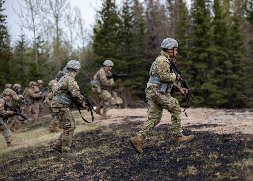 Alaska National Guard Soldiers and Airmen compete amongst one another in a series of marksmanship events at Joint Base Elmendorf-Richardson, May 15, 2021, as part of the 2021 Alaska National Guard Adjutant General Match, or TAG Match. TAG Match is a marksmanship competition comprising several timed pistol and rifle events. (U.S. Army National Guard photo by Spc. Grace Nechanicky)