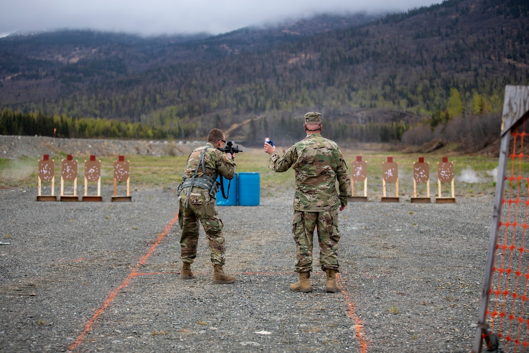 Alaska National Guard Soldiers and Airmen compete amongst one another in a series of marksmanship events at Joint Base Elmendorf-Richardson, May 15, 2021, as part of the 2021 Alaska National Guard Adjutant General Match, or TAG Match. TAG Match is a marksmanship competition comprising several timed pistol and rifle events. (U.S. Army National Guard photo by Spc. Jacob Stone)