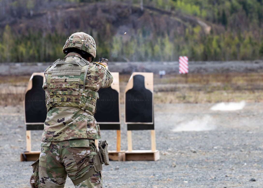 Alaska National Guard Soldiers and Airmen compete amongst one another in a series of marksmanship events at Joint Base Elmendorf-Richardson, May 15, 2021, as part of the 2021 Alaska National Guard Adjutant General Match, or TAG Match. TAG Match is a marksmanship competition comprising several timed pistol and rifle events. (U.S. Army National Guard photo by Spc. Jacob Stone)