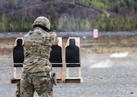 Alaska National Guard Soldiers and Airmen compete amongst one another in a series of marksmanship events at Joint Base Elmendorf-Richardson, May 15, 2021, as part of the 2021 Alaska National Guard Adjutant General Match, or TAG Match. TAG Match is a marksmanship competition comprising several timed pistol and rifle events. (U.S. Army National Guard photo by Spc. Jacob Stone)