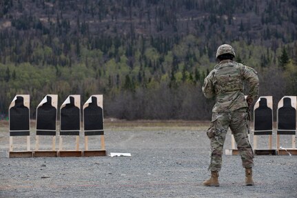 Alaska National Guard Soldiers and Airmen compete amongst one another in a series of marksmanship events at Joint Base Elmendorf-Richardson, May 15, 2021, as part of the 2021 Alaska National Guard Adjutant General Match, or TAG Match. TAG Match is a marksmanship competition comprising several timed pistol and rifle events. (U.S. Army National Guard photo by Spc. Jacob Stone)