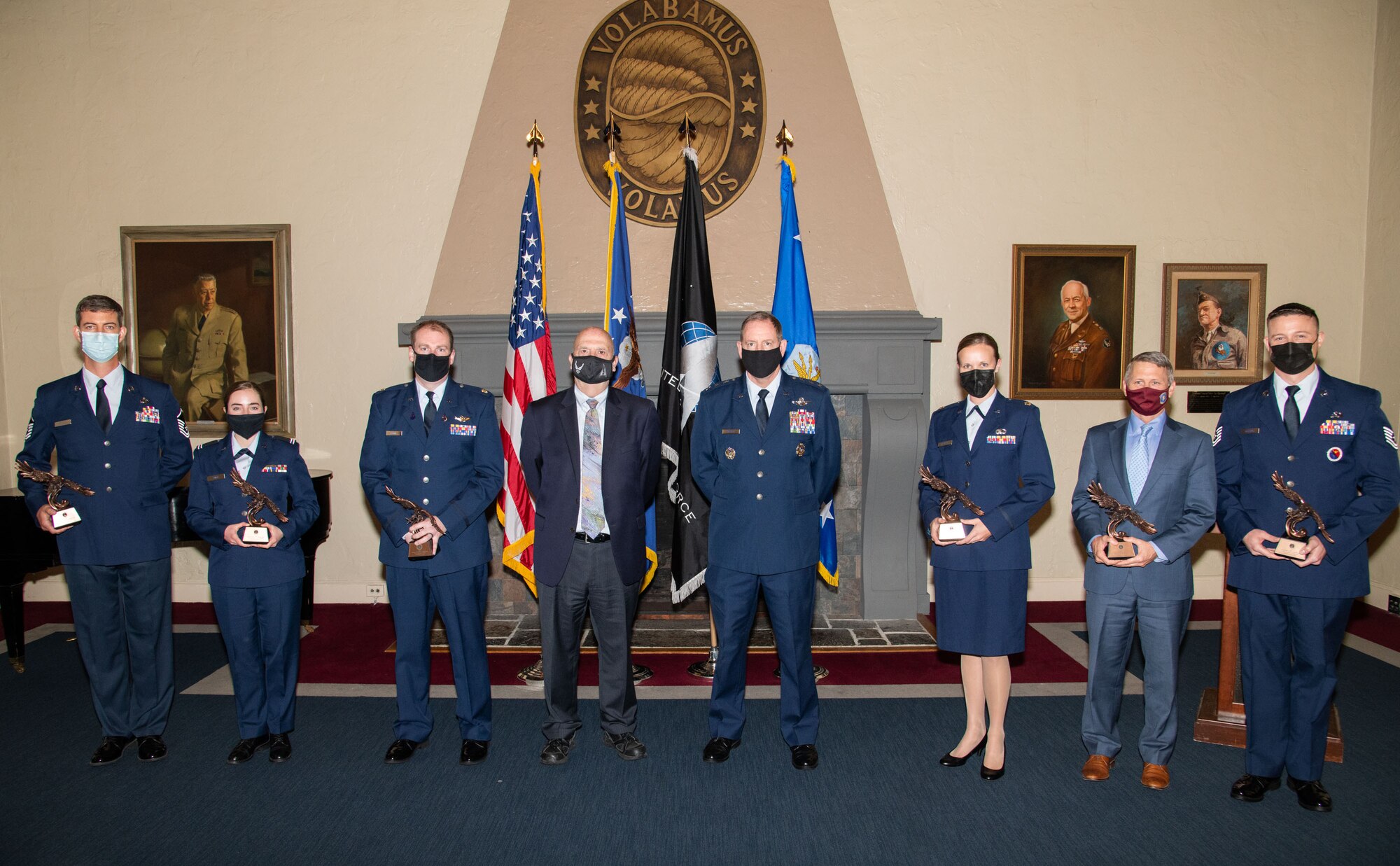 The Honorable John Roth, acting secretary of the Air Force, center left, and Lt. Gen. James Hecker, Air University commander and president, center right, stand with recipients of the 2021 Secretary of the Air Force Leadership Awards, May 11, 2021, at Maxwell Air Force Base, Alabama. The award is presented annually to Air University faculty, staff and students who have displayed exemplary leadership, character and ethical behavior that distinguished them from their peers. Award recipients pictured are (left-right): Master Sgt. Charles Simper, Cadet Wing Commander Kierenne Eadie, U.S. Space Force Maj. Kyle Keith, Maj. Tamara Merritt, Jason Womack and Tech. Sgt. Daniel Keeling. Master Sgt. Jaime Matekaitis was not available to receive the award in person. (U.S. Air Force photo by William Birchfield)