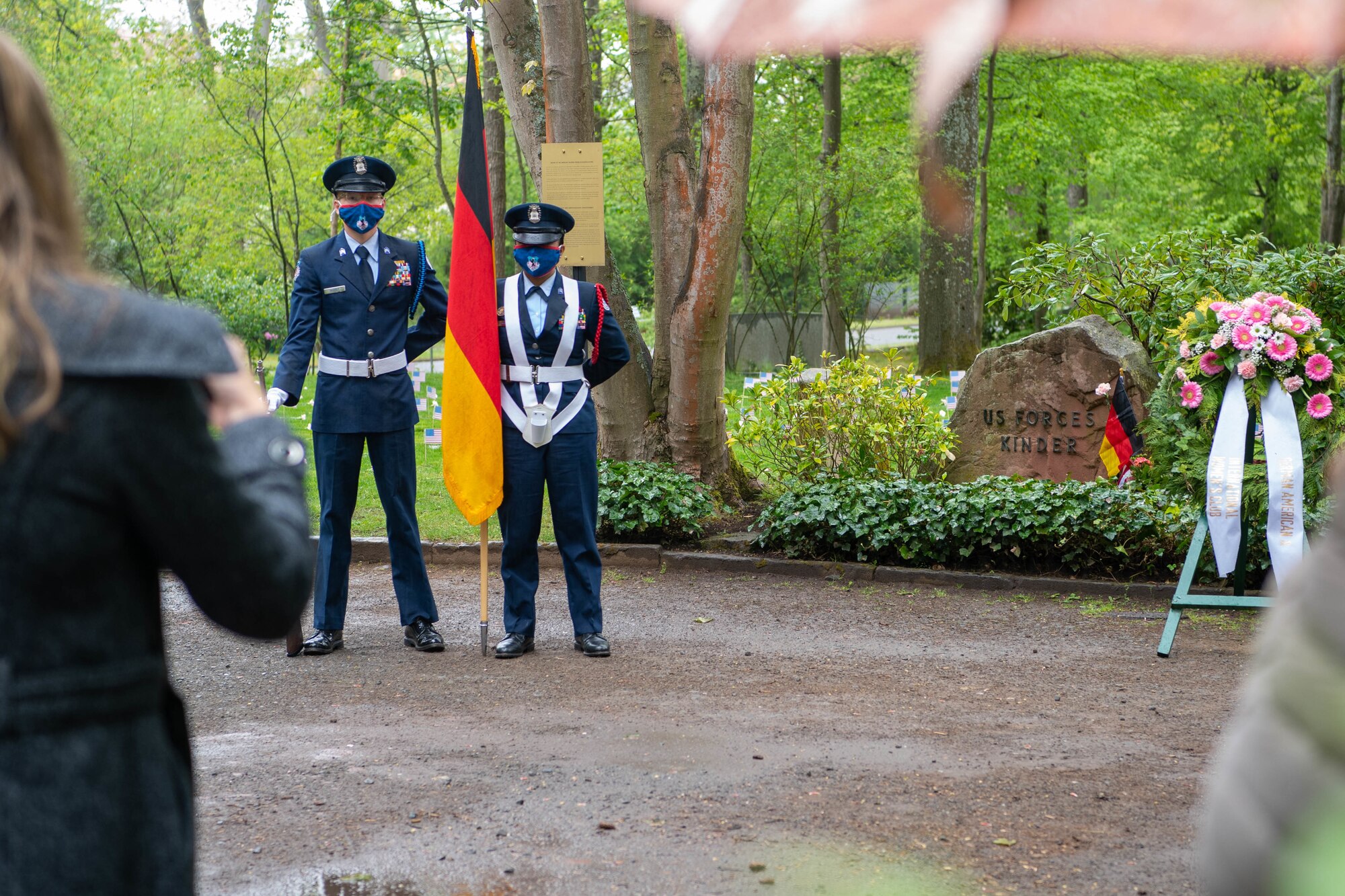 Members of the Reserve Officers’ Training Corps stand at gravesite