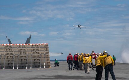 An F/A-18E Super Hornet, assigned to the "Sunliners" of Strike Fighter Squadron (VFA) 81, takes off from the flight deck of the Nimitz-class aircraft carrier USS Harry S. Truman (CVN 75) during carrier qualifications after completing an extended incremental availability.