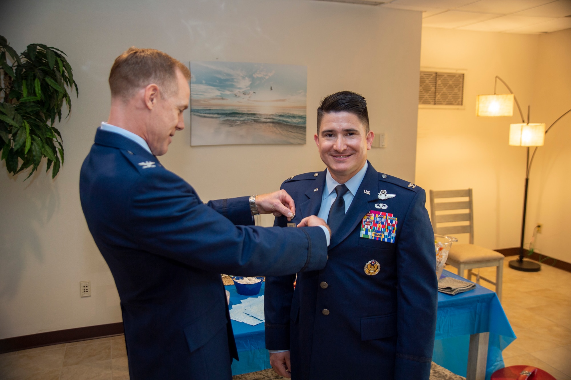 Col. Benjamin R. Jonsson, the 6th Air Refueling Wing commander, pins a command pin onto Col. Jonathan E. Burdick, the assuming 6th Operations Group (OG) commander, at the 6th OG change of command ceremony at MacDill Air Force Base, Florida, May 17, 2021. Prior to taking command of the 6th OG, Burdick was the chief of the Mobility Division, Directorate of Global Reach, for the Office of the Assistant Secretary of the Air Force for Acquisition, Technology, and Logistics, Headquarters U.S. Air Force. (U.S. Air Force photo by Airman 1st Class David D. McLoney)