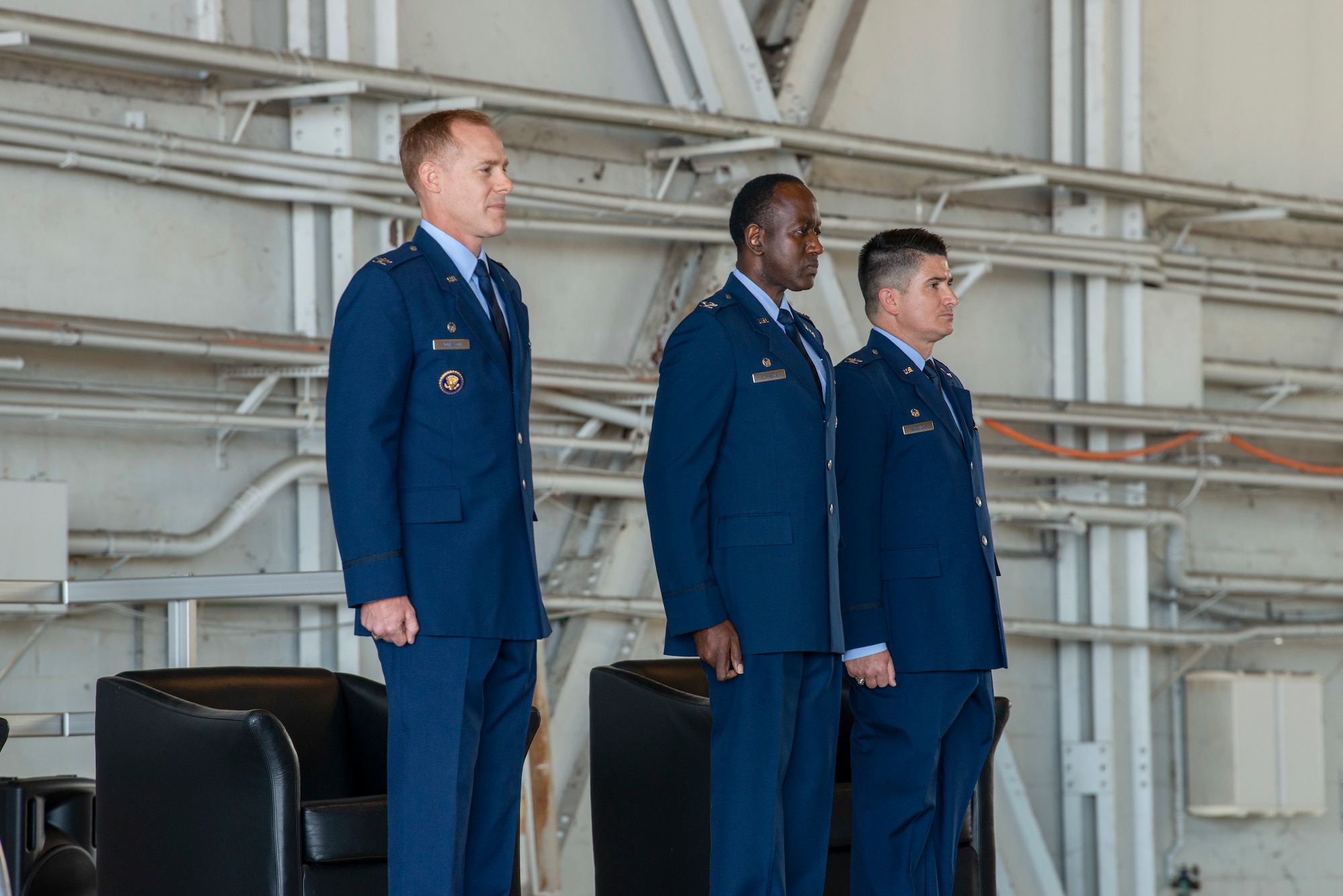 From left, Col. Benjamin R. Jonsson, the 6th Air Refueling Wing commander, Col. Travis L. Edwards, the outgoing 6th Operations Group (OG) commander, and Col. Jonathan E. Burdick, the assuming 6th OG commander, stand at attention at the 6th OG change of command ceremony at MacDill Air Force Base, Florida, May 17, 2021. The change of command ceremony is a ceremony used to represent the passing of authority and responsibility from one commander to another. (U.S. Air Force photo by Airman 1st Class David D. McLoney)