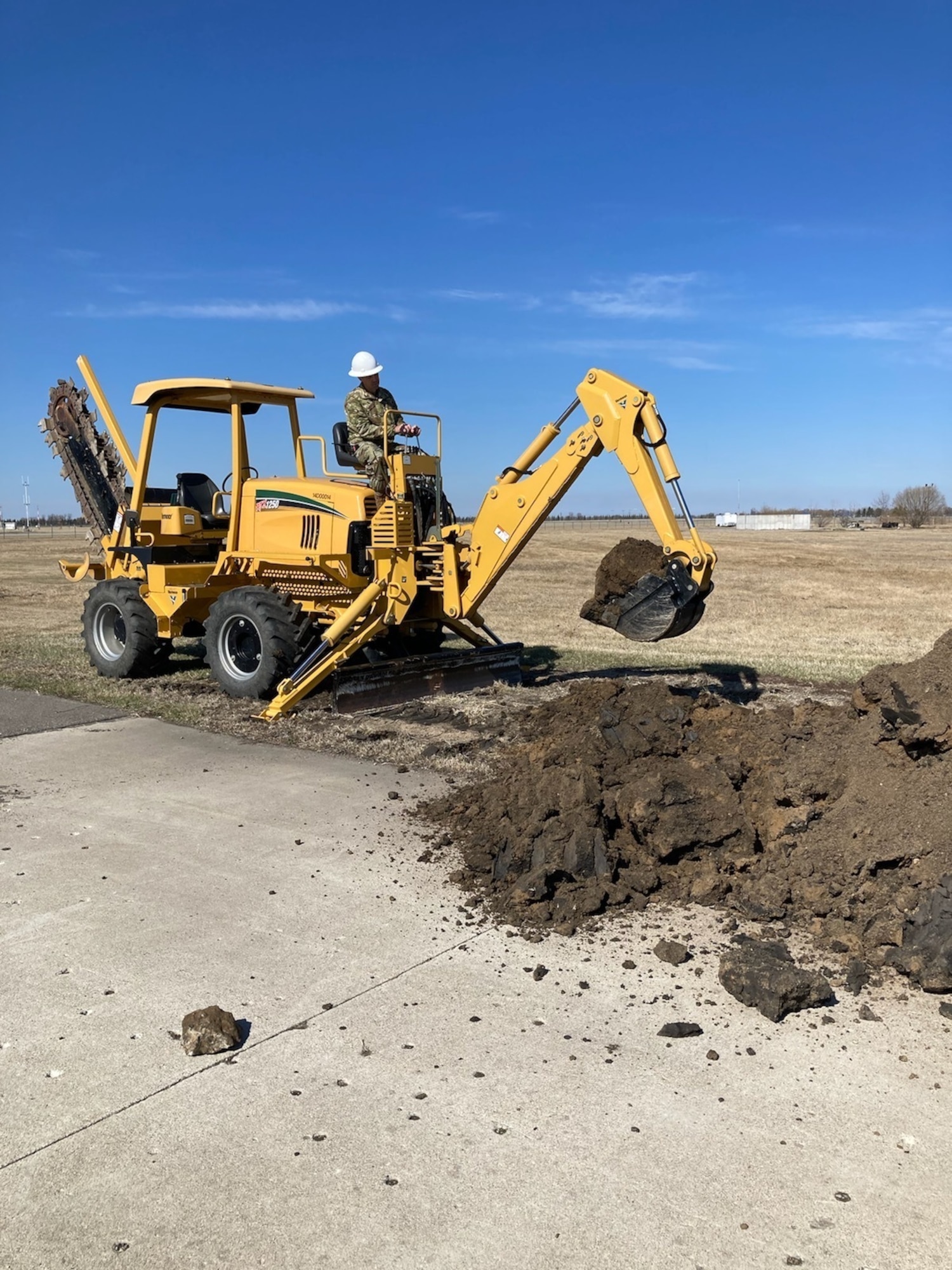 1st Lt. Justin Johansen, readiness flight commander of the 155th Civil Engineer Squadron, practices trencher operations at the North Dakota Air National Guard Regional Training Site in Fargo, N.D., April 12, 2021. Nebraska Air National Guard members traveled to the RTS to receive upgrade training in six different career fields, allowing them to become more experienced and knowledgeable in their career field. (Courtesy photo by Senior Master Sgt. Sarah Bredthauer)
