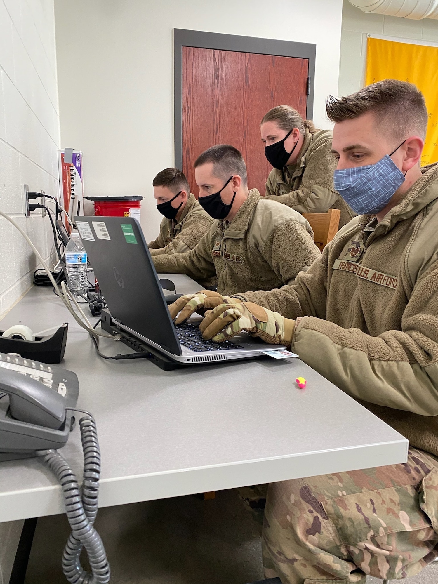 Members of  the 155th Civil Engineer Squadron, take time to document their tasks during training at the North Dakota Air National Guard Regional Training Site (RTS) in Fargo, N.D., April 11, 2021.  Nebraska Air National Guard members traveled to the RTS to receive upgrade training in six different career fields, allowing them to become more experienced and knowledgeable in their career field. (Courtesy photo by Senior Master Sgt. Sarah Bredthauer)